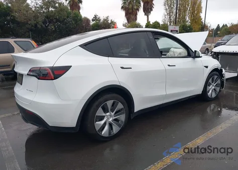 2023 Tesla Model Y Awd/Long Range Dual Motor All-Wheel Drive z USA, uszkodzony, nr VIN 7SAYGDEE7PA091564